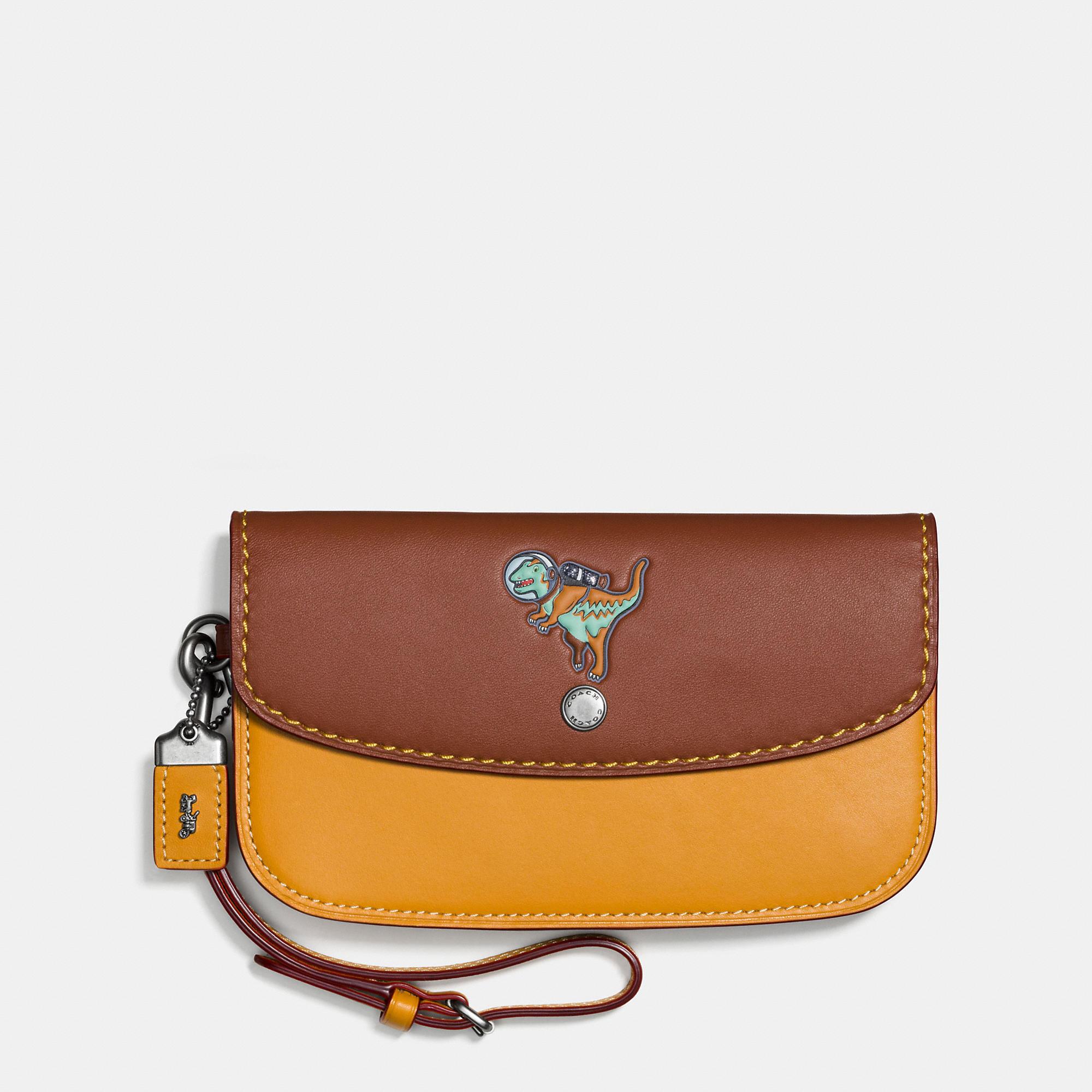 Coach Clutch In Glovetanned Leather With Embossed Space Rexy | Lyst